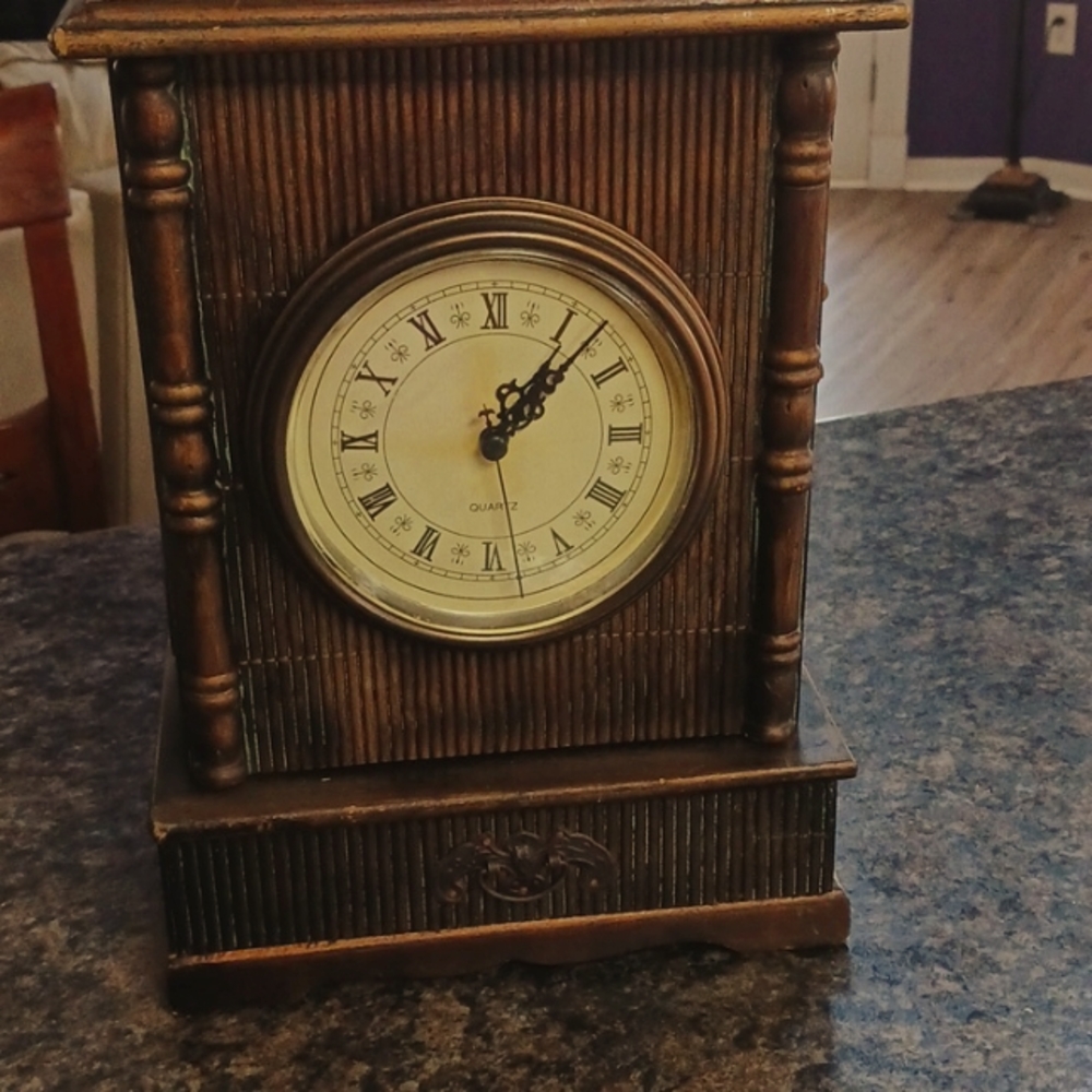 Antique clock with stash/storage